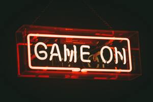 Game on Neon Sign in black and white and red colours