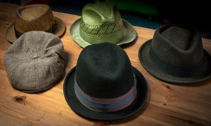 Collection of hats, stingy, trilby, and fedoras by Sean P. Durham